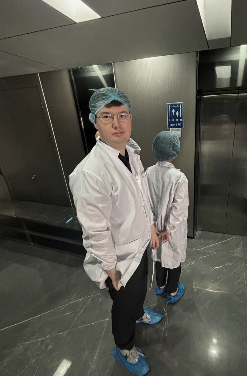 Malcolm Göckede during a quality-control visit at a manufacturing facility in mainland China